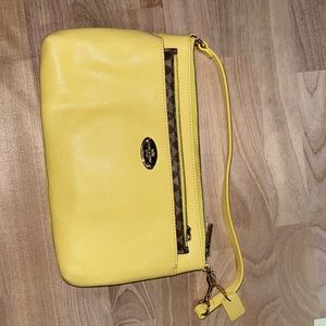 Coach wristlet, coated canvas.